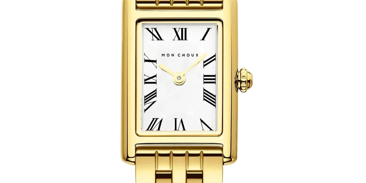 A gold rectangle wristwatch with a white face featuring Roman numerals and a gold 5 link bracelet with butterfly clasp